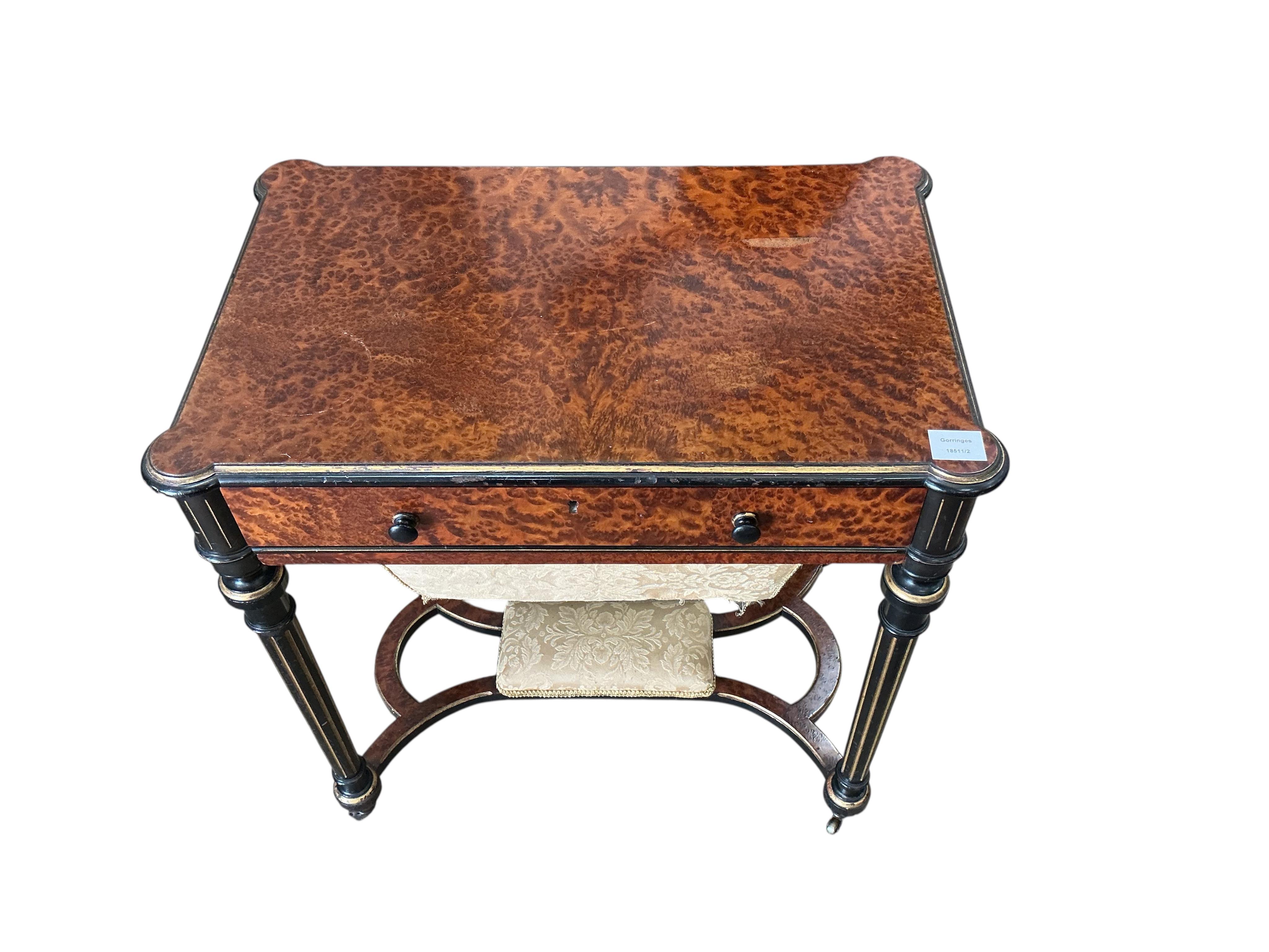 A late 19th century parcelgilt and ebonised amboyna work table, width 68cm, depth 44cm, height 72cm